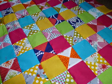 Stitch and Pieces: Quarter Square Triangles Quilt: a quilt in progress