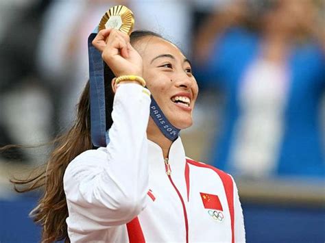 China's Zheng Qinwen makes history with Olympic tennis singles gold ...