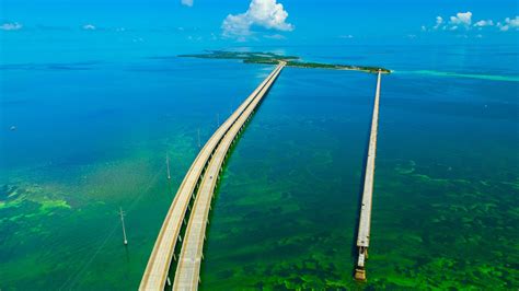 The Overseas Highway from Miami along the Florida Keys - elegant bridges span glittering ...