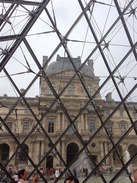 The Louvre from inside the pyramid | Louvre, Paris, Pyramids