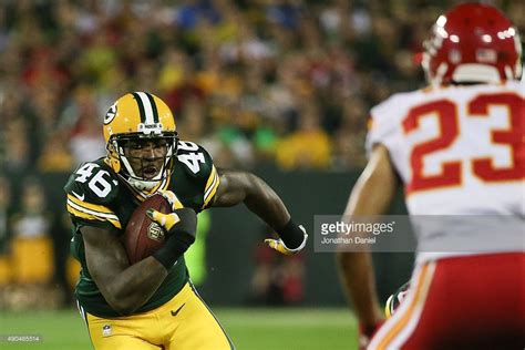 Alonzo Harris #46 of the Green Bay Packers carries the football against ...