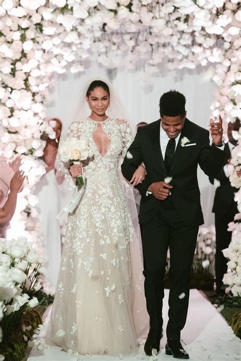 Chrissy Teigen Wore a Stunning Fringed Gown to Chanel Iman's Wedding | Blush pink wedding dress ...