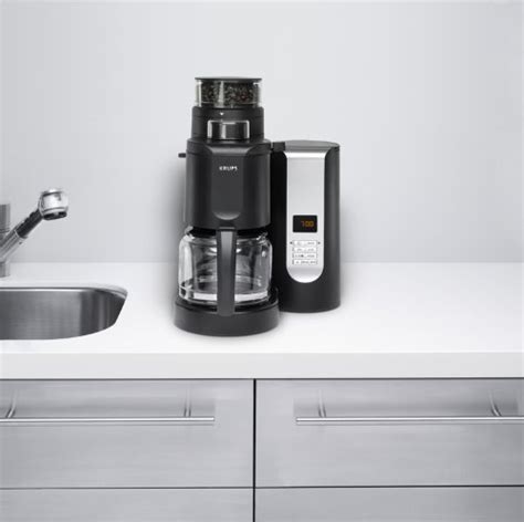 KRUPS KM7005 Grind and Brew Coffee Maker with Stainless Steel Conical Burr Grinder, 10-cup, Black