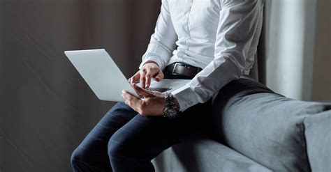 Man Typing on Laptop · Free Stock Photo