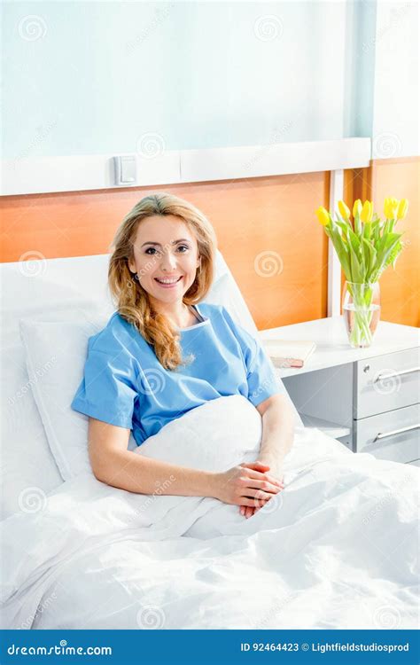 Smiling Woman Lying in Hospital Bed Stock Image - Image of diagnosis, alone: 92464423