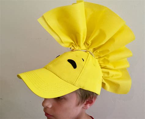 Woodstock costume made from a yellow baseball cap and stiff fabric | Charlie brown halloween ...