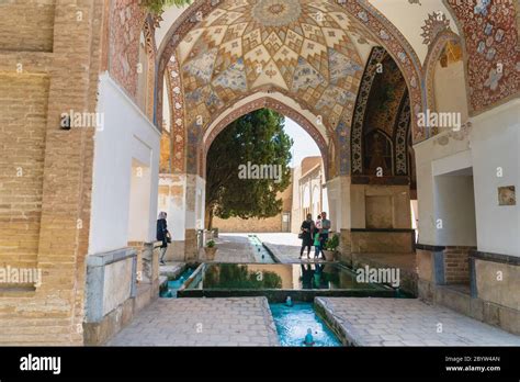 Kashan, Iran - June 2018: Fin Garden in Kashan, Iran and visitors - Fin Garden is one of the ...