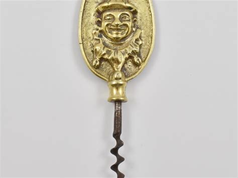 An English cast brass single sided corkscrew with a depiction of Mr Punch. – The Old Corkscrew ...