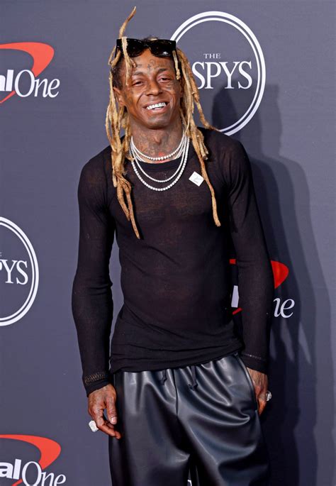 Lil Wayne’s Wax Figure Left Him Seeing Red: ‘Dat S—t Ain’t Me’ | Us Weekly