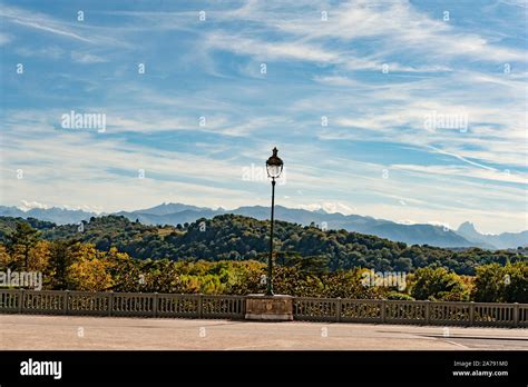 The french Pyrenees seen from the Boulevard des Pyrenees in Pau, Béarn ...