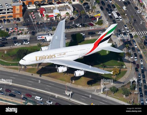 Emirates Airline Airbus A380 airplane landing. Aerial view of Emirates ...