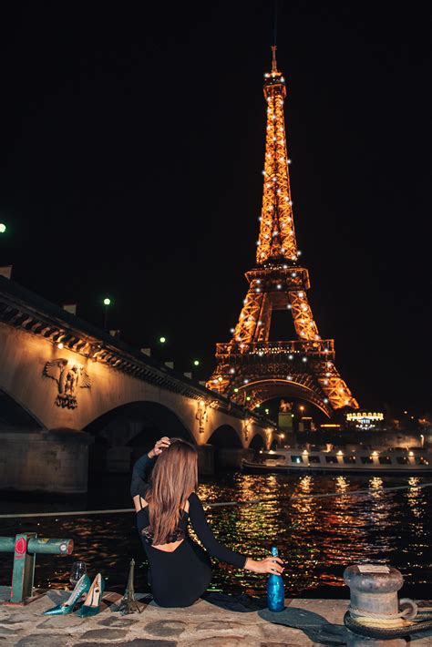 night photosession for a girl in Paris with #parisphotographer Girl in front of the Eiffel tower ...