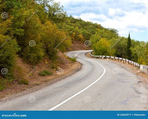 Mountain road turn stock image. Image of rock, season - 23843977