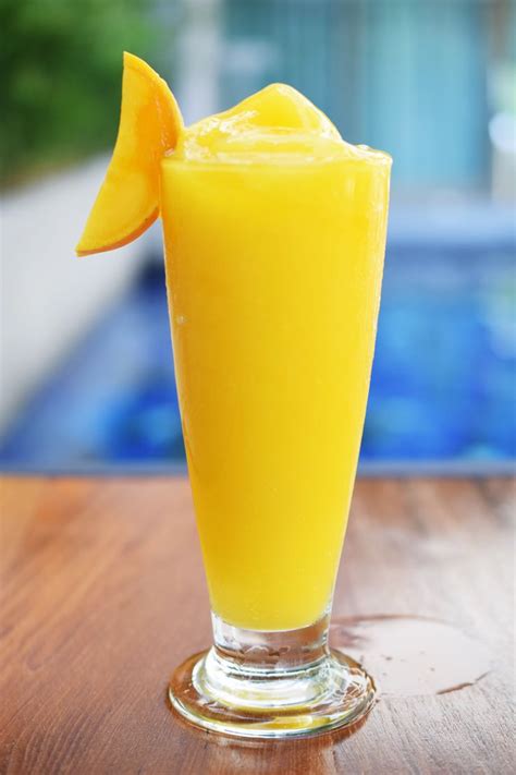 Mango Delight Cocktail And Mocktail, Mocktails, Medley, Ada, Pint Glass ...