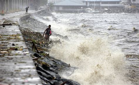 Typhoon leaves 2 dead, thousands displaced in Philippines - CBS News