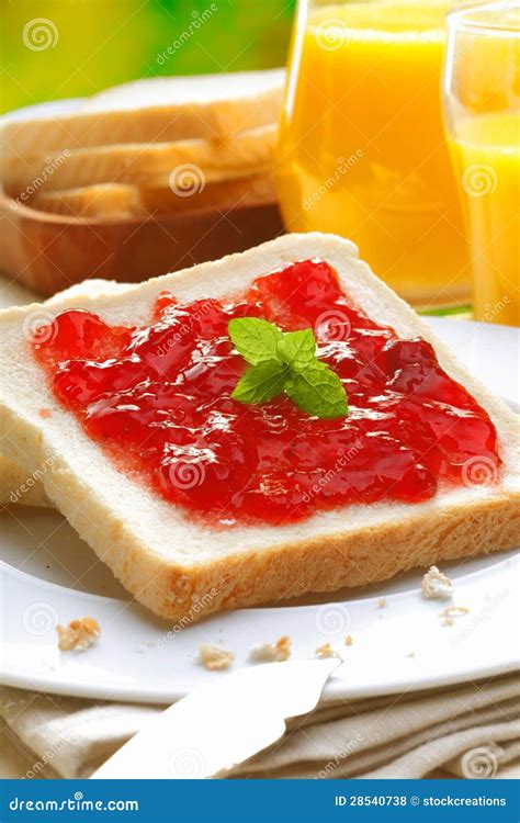 Colourful Strawberry Preserve on Bread Stock Photo - Image of appetizing, orange: 28540738