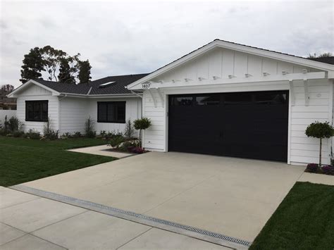 Black CHI Carriage Door in Newport Beach - CityScape Garage Doors