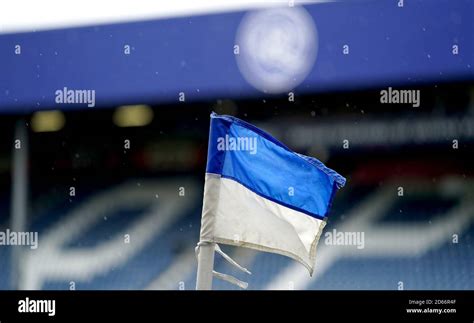 A corner flag blowing in the wind inside Queens Park Rangers' stadium ...