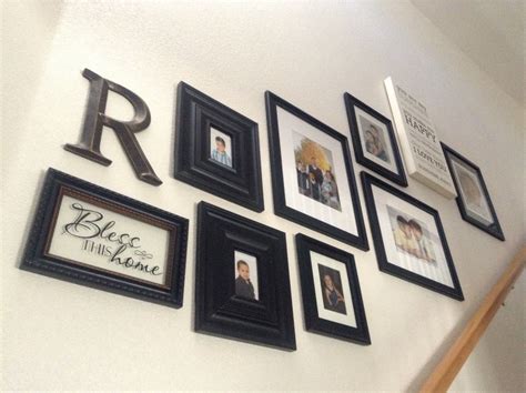 Black frame collage up the stairway | Home, Collage frames, Gallery wall