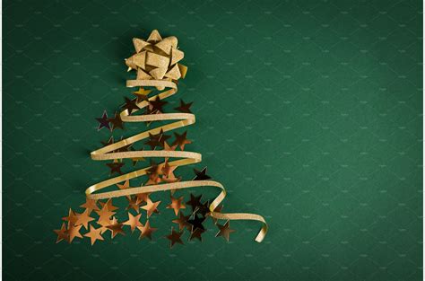 Christmas tree made of gold ribbon | Holiday Stock Photos ~ Creative Market