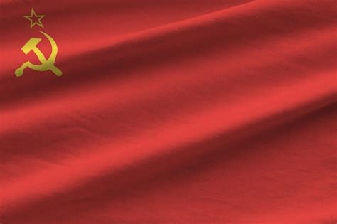 Premium Photo | Soviet union flag with big folds waving close up under the studio light indoors ...