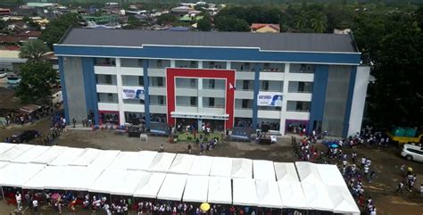 PIA - Gingoog LGU, Sen. Bong Go turnover new 4-story CCGC Building