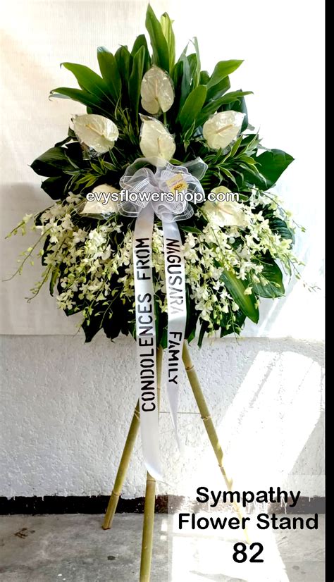 sympathy flower stand 82- Evys Flowershop I Call 3305174 - Free Delivery