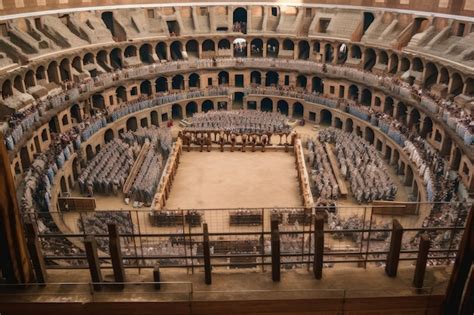 Premium AI Image | Gladiator battle in the colosseum with spectators ...