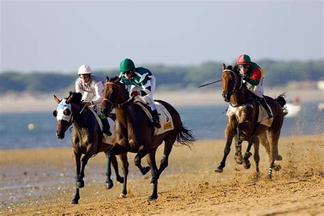 Horse racing on the beach Photograph by Felipe Rodriguez - Pixels