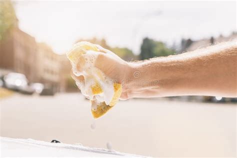 Hand Wring Out a Sponge for Washing Car Stock Image - Image of transport, automobile: 238046059