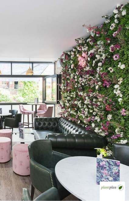 Wall feature restaurant interiors 33 Ideas | Creative wall decor, Flower wall decor, Cafe ...