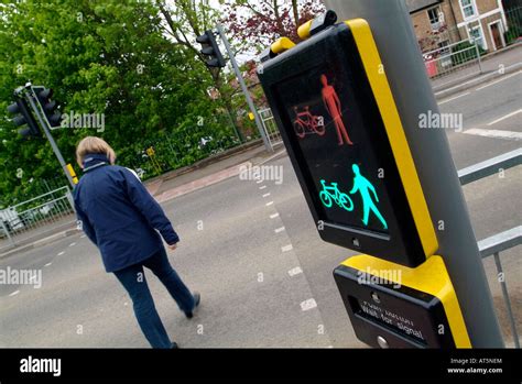 Pedestrian crossing road using Toucan crossing Stock Photo, Royalty ...