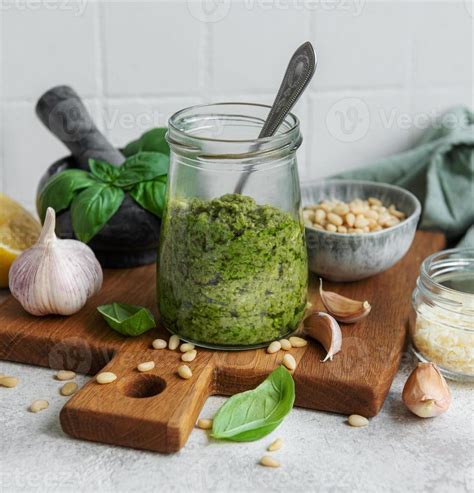 Green basil pesto 15938760 Stock Photo at Vecteezy