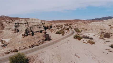 Car Driving Along The Desert Road in Nevada, Stock Footage | VideoHive