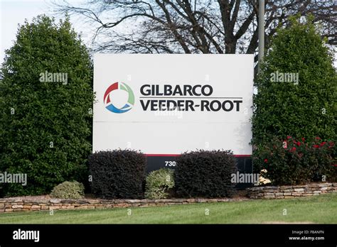 A logo sign outside of the headquarters of Gilbarco Veeder-Root in Greensboro, North Carolina on ...