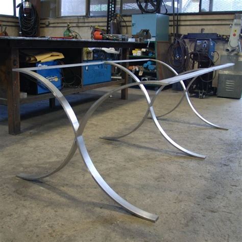 Hand Crafted Custom Stainless Steel Table Frame And Pecan Top by Sarabi Studio | CustomMade.com