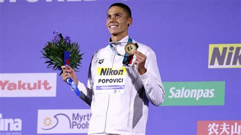 David Popovici, world champion swimmer, melts gold medal for children with cancer - NBC Sports