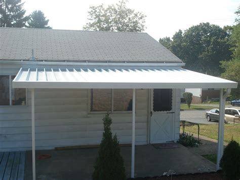 Crest 700 Flat Pan Aluminum Awning in White. | Aluminum awnings, Garage doors, Entry doors