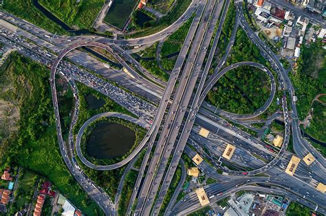 Aerial view of traffic jams at Nonthaburi intersection in the evening, Bangkok. Photograph by ...