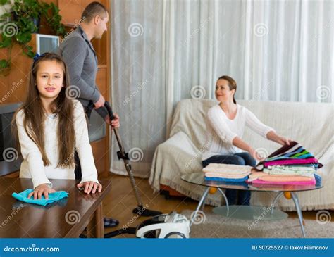 Girl with Parents Cleaning at Home Stock Image - Image of cleanup ...