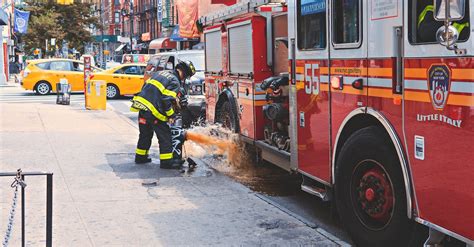 Fireman in Front of Fire Truck · Free Stock Photo