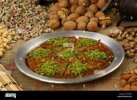 Delicious traditional Turkish dessert kunefe with pistachio powder ...