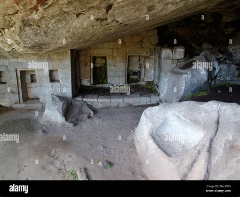 The Temple of the Moon in a cave beneath the peak of Huayna Picchu at the ancient Inca ruins of ...