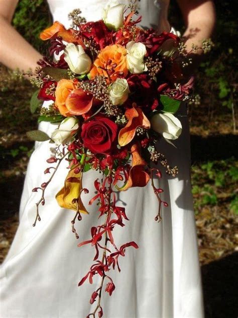 Red and Burnt Orange Fall Wedding Bouquets, Red Bridesmaid Dresses, White Bridal Gown | Fall ...