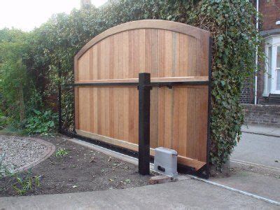 electric cantilever driveway gates - Google Search | Wooden gate designs, Wooden gates, Gates ...