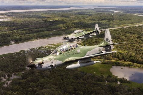 Brazilian EMB-314 Super Tucanos Flying Over the Amazon [3888 x 2589] : r/WarplanePorn