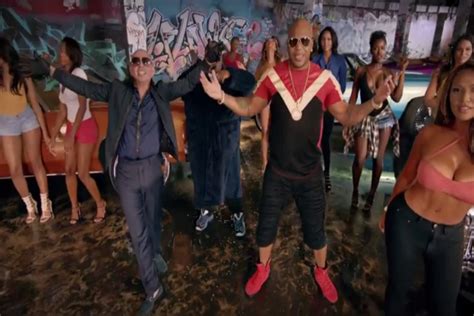 Pitbull and Flo Rida Drag Race in 'Greenlight' Video Featuring LunchMoney Lewis