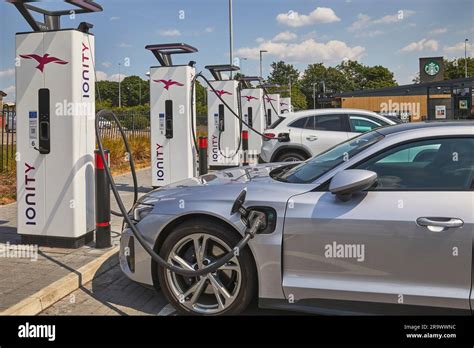 The future is here: electric vehicles charging at an electric vehicle ...