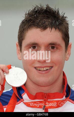David Davies celebrates after winning the first set during his match