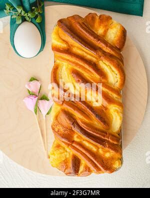Wooden Board With Delicious Easter Cake And Pussy Willow Branches On